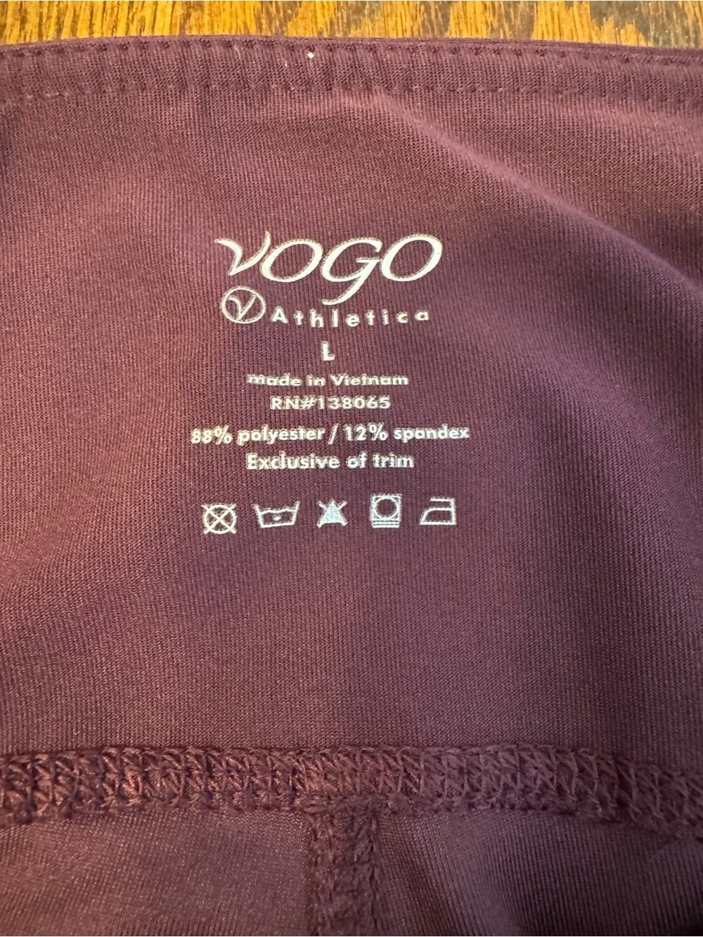 VOGO Athletica Deep Plum Capri Leggings with Side Pockets